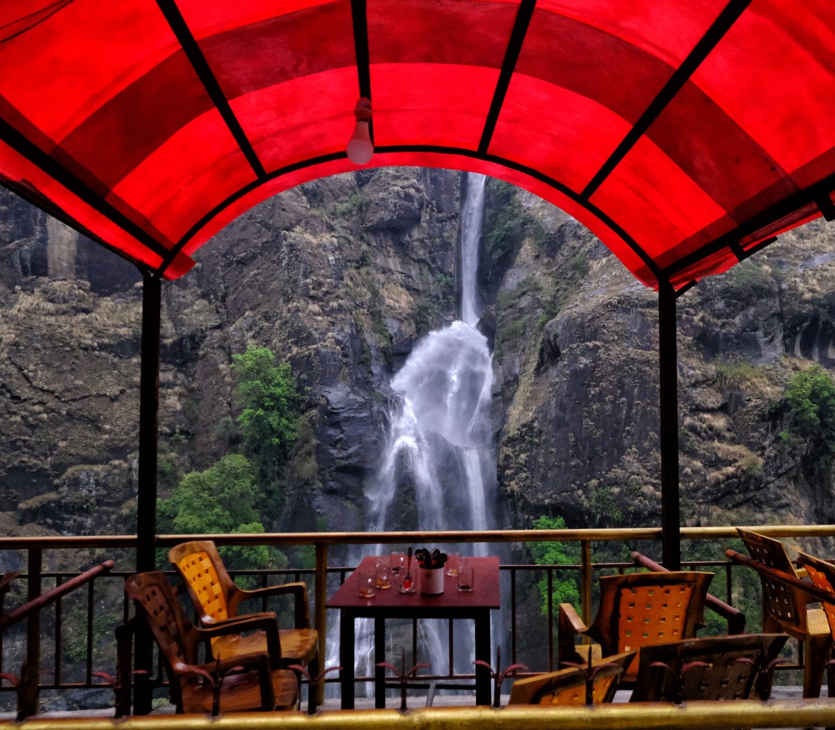 A long drive to Chame from Pokhara. Coffee stop at the Chamche waterfall