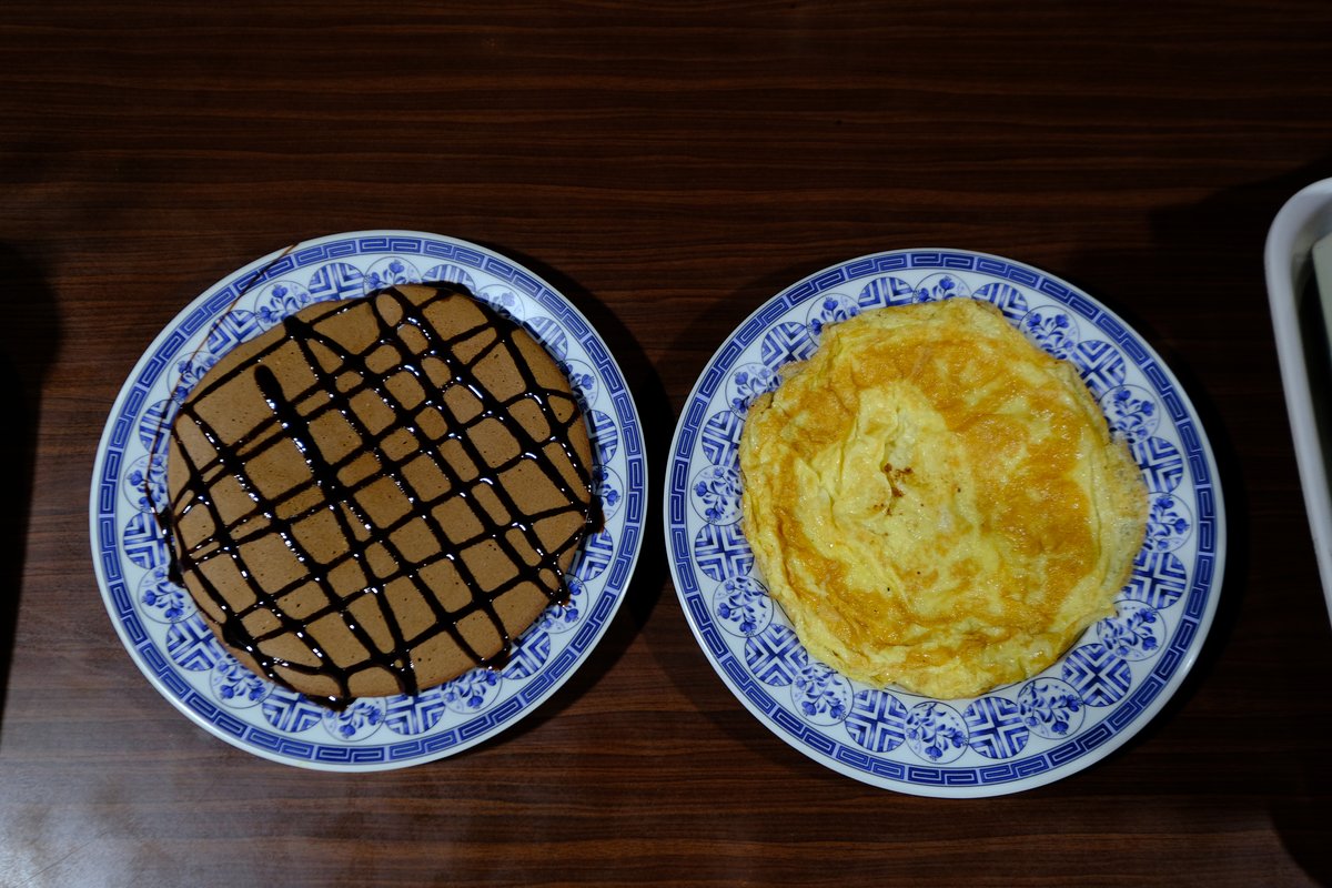Being able to order food from a menu each day was a luxury, but the food itself was a hit or miss. Chocolate pancake and an omelette.