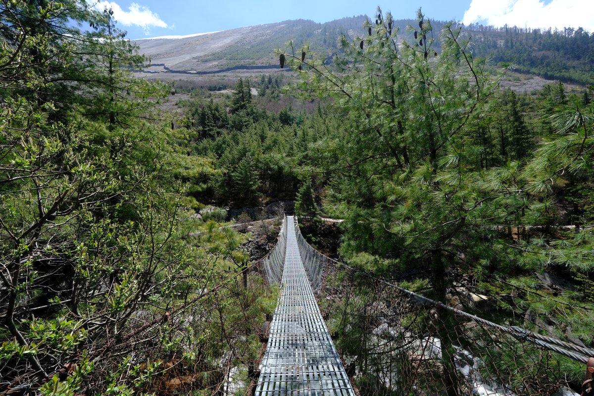 Long suspension bridges are common and are a delightful way to cross the river.