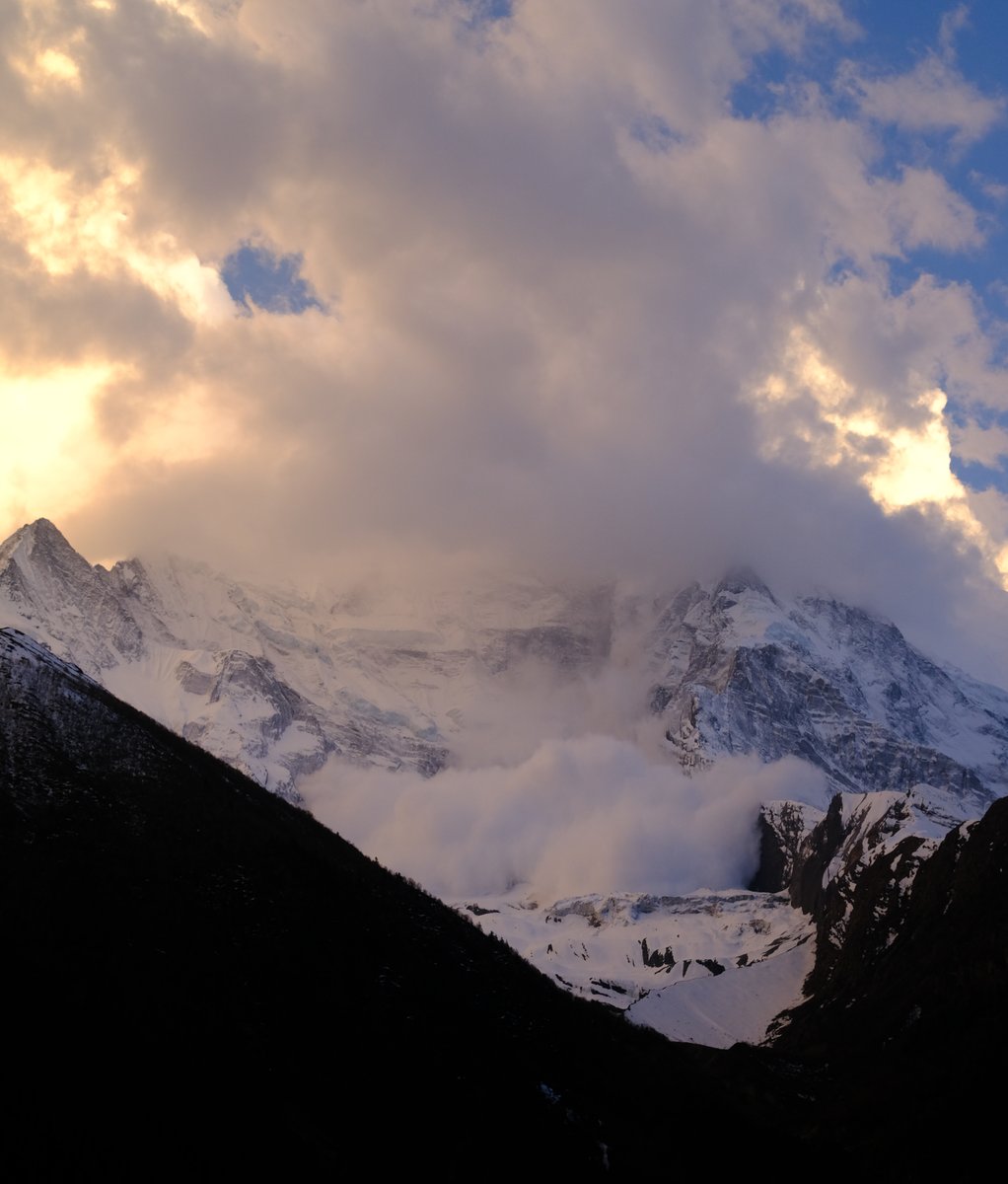 Around sunset, there was a sudden thud and we ran out to see an avalanche, progressing down the slope with seeming infinite slowness